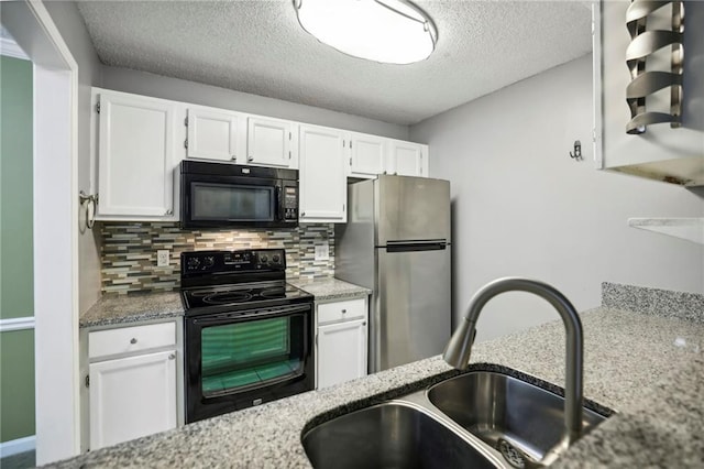 511 Barrington Hills Dr, Atlanta, GA 30350 - kitchen featuring black appliances, a sink, white cabinetry, decorative backsplash, and a textured ceiling