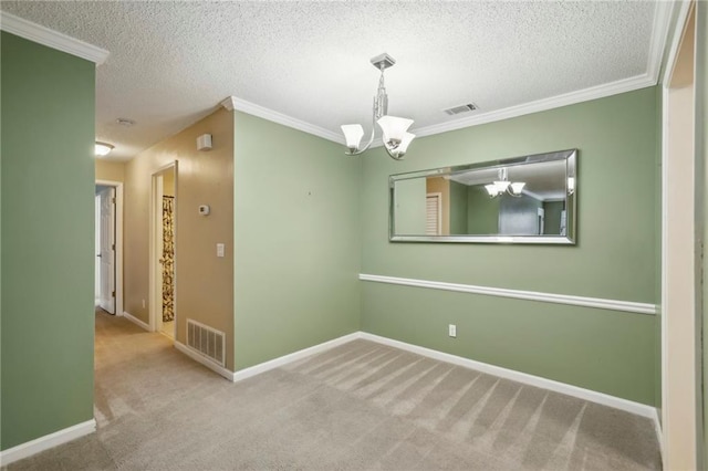 511 Barrington Hills Dr, Atlanta, GA 30350 - unfurnished room with a chandelier, crown molding, carpet floors, a textured ceiling, and baseboards