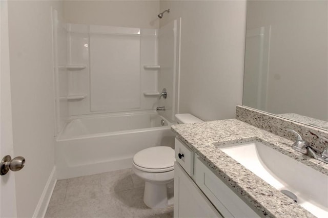 bathroom with bathtub / shower combination, toilet, vanity, tile patterned flooring, and baseboards