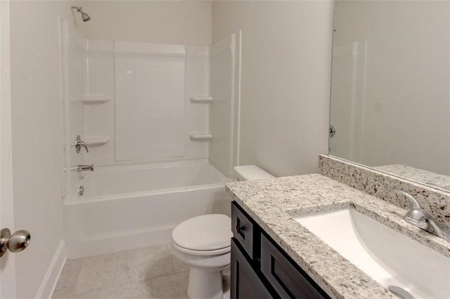 full bath with shower / tub combination, vanity, toilet, and tile patterned floors