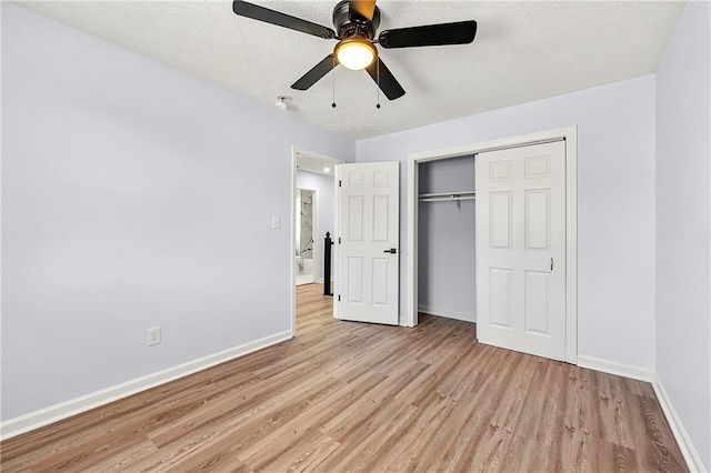 unfurnished bedroom featuring a closet, ceiling fan, and light hardwood / wood-style flooring