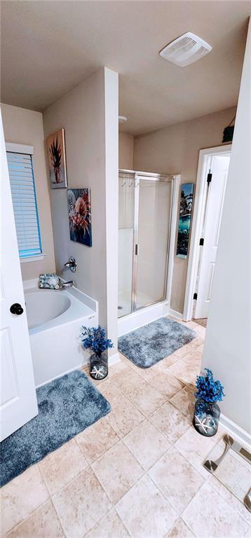 bathroom with plus walk in shower