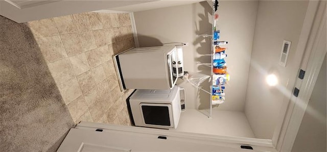 kitchen featuring white cabinetry