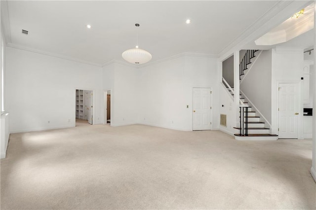 basement with ornamental molding and light carpet