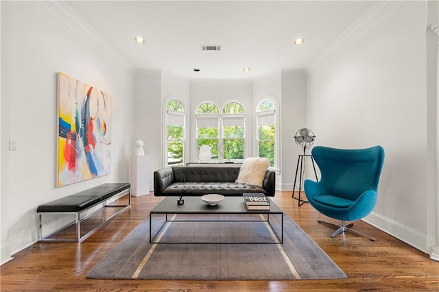 living room featuring crown molding and dark hardwood / wood-style floors