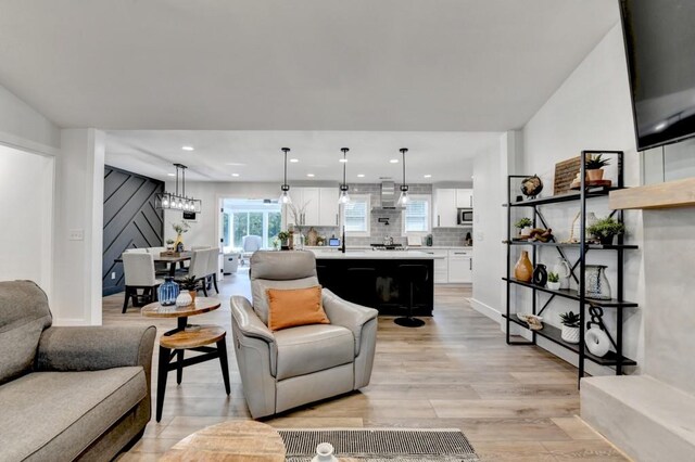 5441 E Main St, Flowery Branch, GA 30542 - living area with light wood-style flooring, recessed lighting, a ceiling fan, and lofted ceiling