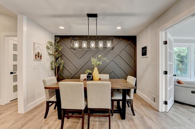 5441 E Main St, Flowery Branch, GA 30542 - dining room featuring light wood-style flooring, recessed lighting, and a decorative wall