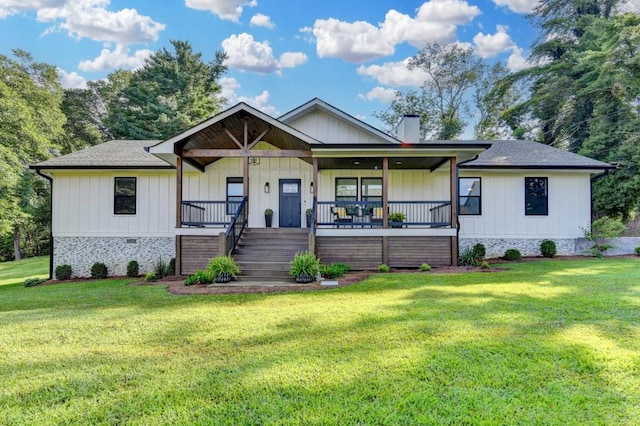 5441 E Main St, Flowery Branch, GA 30542 - view of front of home featuring covered porch, a front yard, stairs, a chimney, and board and batten siding