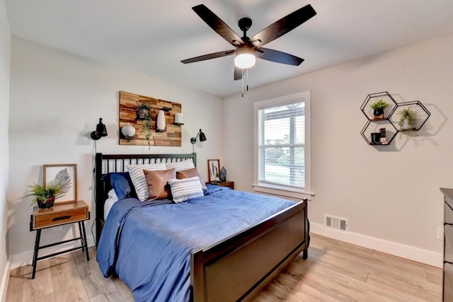 5441 E Main St, Flowery Branch, GA 30542 - bedroom featuring light wood-style floors and ceiling fan