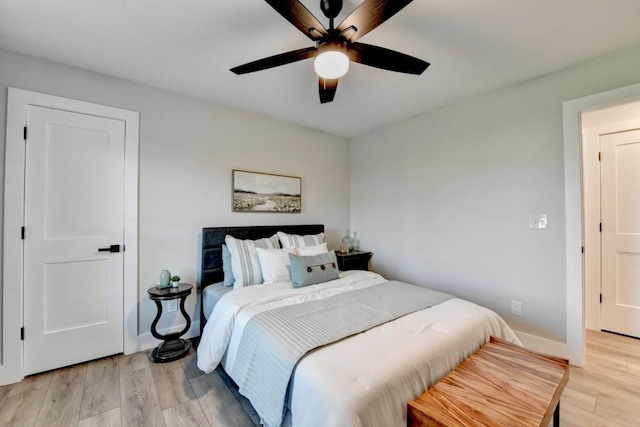 5441 E Main St, Flowery Branch, GA 30542 - bedroom featuring light wood-type flooring and a ceiling fan