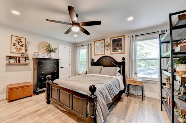 5441 E Main St, Flowery Branch, GA 30542 - bedroom featuring light wood-type flooring, recessed lighting, and a ceiling fan