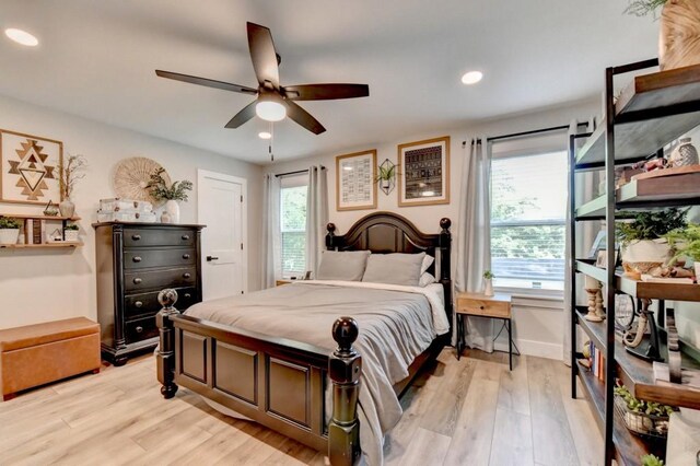 5441 E Main St, Flowery Branch, GA 30542 - bedroom featuring light wood-type flooring, recessed lighting, and a ceiling fan