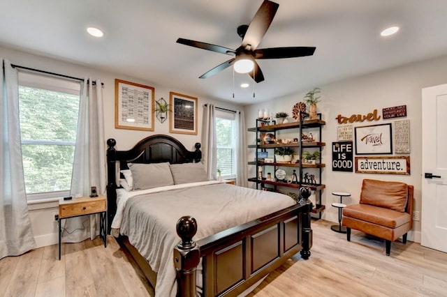 5441 E Main St, Flowery Branch, GA 30542 - bedroom featuring light wood-style flooring, recessed lighting, and a ceiling fan