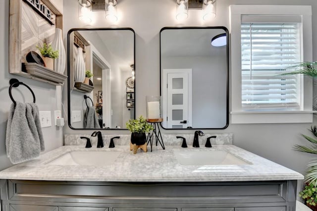 5441 E Main St, Flowery Branch, GA 30542 - full bathroom featuring double vanity and healthy amount of natural light