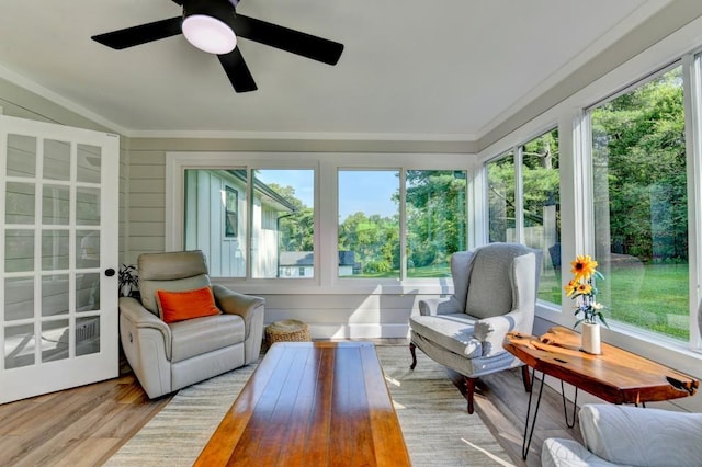 5441 E Main St, Flowery Branch, GA 30542 - sunroom / solarium featuring wood finished floors, ornamental molding, and a wooden deck