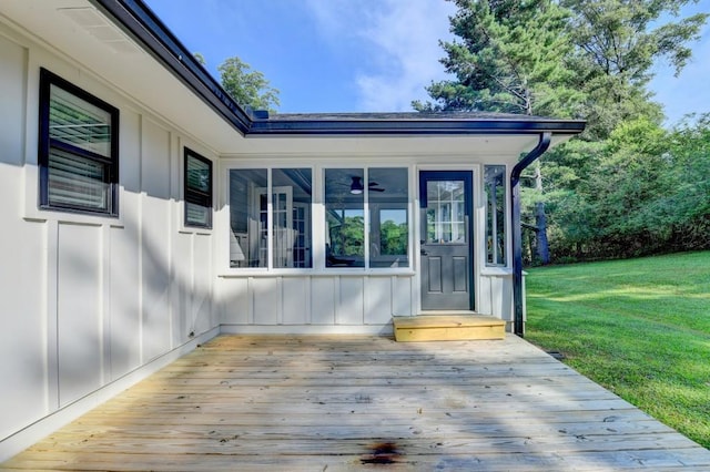 5441 E Main St, Flowery Branch, GA 30542 - property entrance featuring board and batten siding, a yard, and a wooden deck