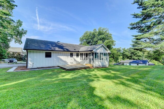 5441 E Main St, Flowery Branch, GA 30542 - view of green lawn with a patio and a sunroom