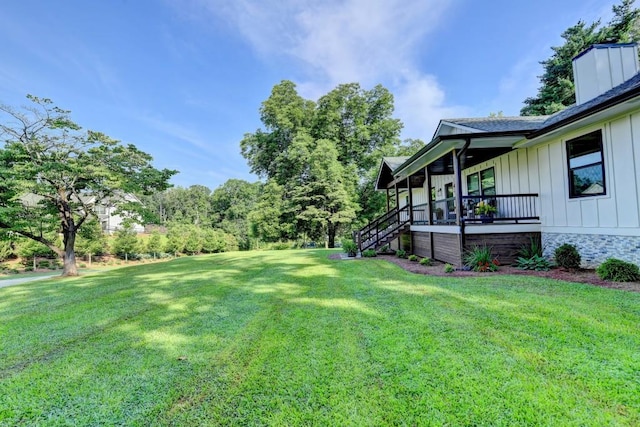 5441 E Main St, Flowery Branch, GA 30542 - view of grassy yard with covered porch and stairs