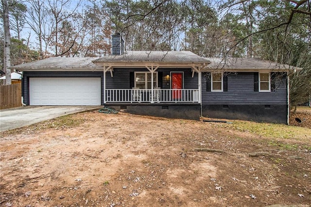 single story home featuring a porch and a garage