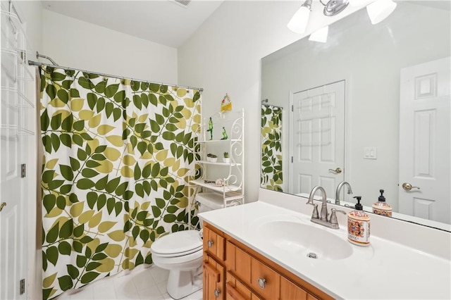 bathroom featuring toilet, tile patterned flooring, a shower with shower curtain, and vanity