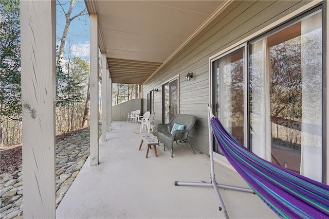 view of patio featuring fence