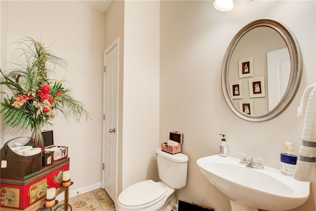 3258 Kessock Ridge Trl, Snellville, GA 30039 - half bathroom featuring a sink and toilet