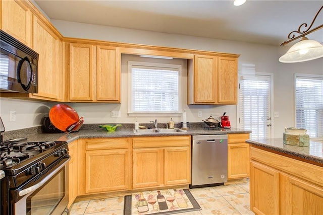 3258 Kessock Ridge Trl, Snellville, GA 30039 - kitchen with appliances with stainless steel finishes, dark countertops, and healthy amount of natural light