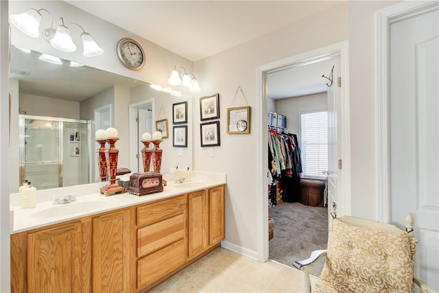 3258 Kessock Ridge Trl, Snellville, GA 30039 - full bathroom with a shower stall, double vanity, and a walk in closet