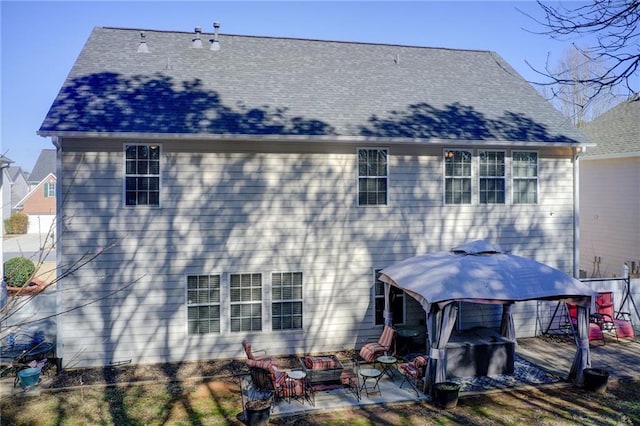 3258 Kessock Ridge Trl, Snellville, GA 30039 - back of property with a gazebo, a patio area, a deck, and an outdoor fire pit