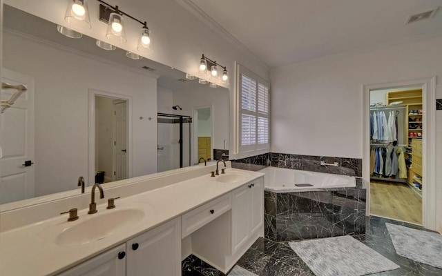 bathroom featuring vanity, ornamental molding, and plus walk in shower