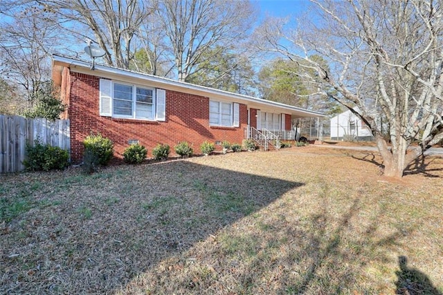 707 E Spring St E, Monroe, GA 30655 - ranch-style house with brick siding and covered porch