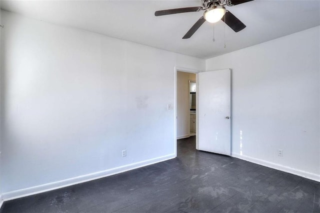707 E Spring St E, Monroe, GA 30655 - spare room featuring baseboards and ceiling fan