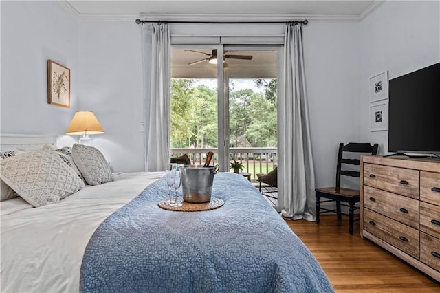 137 Oakton S, Eatonton, GA 31024 - bedroom with wood finished floors, crown molding, and access to outside