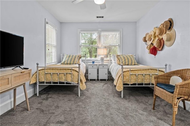 137 Oakton S, Eatonton, GA 31024 - bedroom featuring carpet, visible vents, and a ceiling fan