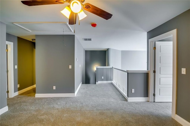 6269 Colonial Vw, Fairburn, GA 30213 - carpeted spare room with attic access, ceiling fan, and baseboards