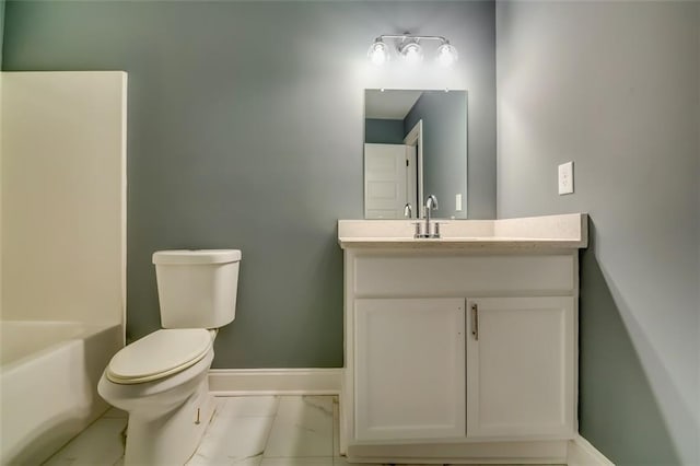 6269 Colonial Vw, Fairburn, GA 30213 - full bathroom with baseboards, vanity, toilet, and marble finish floors
