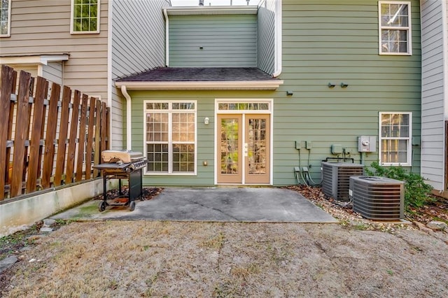 6269 Colonial Vw, Fairburn, GA 30213 - back of house with central AC unit and a patio area