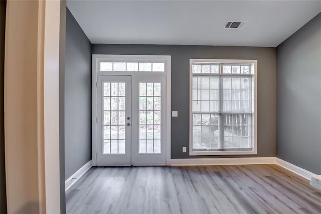6269 Colonial Vw, Fairburn, GA 30213 - entryway with wood finished floors, baseboards, and french doors
