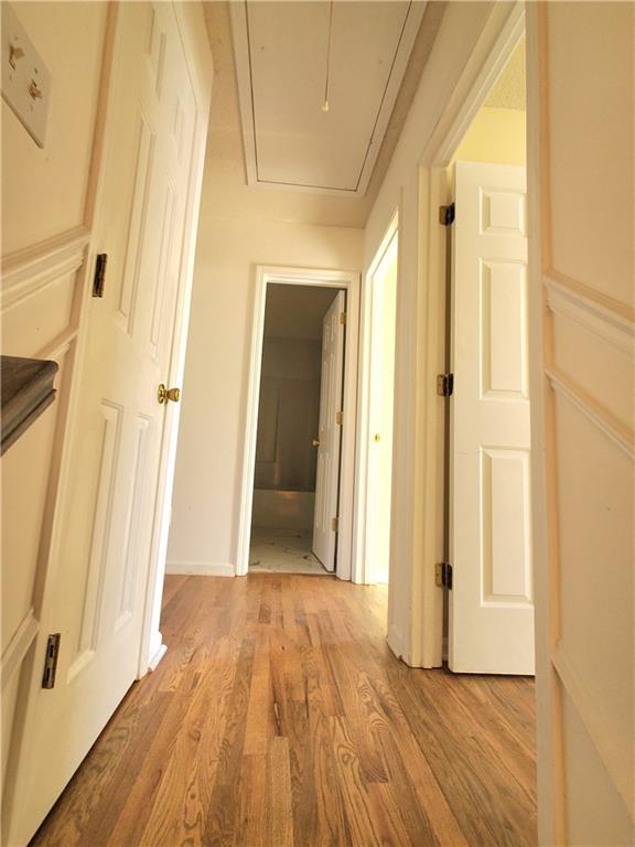 hall featuring light hardwood / wood-style floors