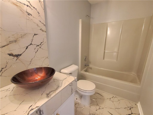 full bathroom with toilet, shower / tub combination, and sink