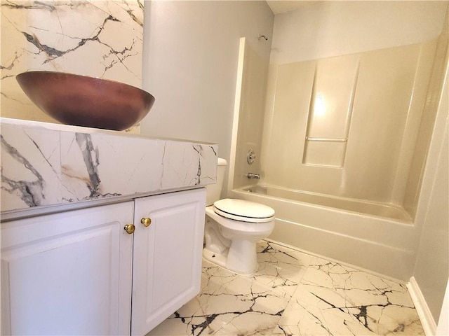 full bathroom with vanity, toilet, and shower / washtub combination