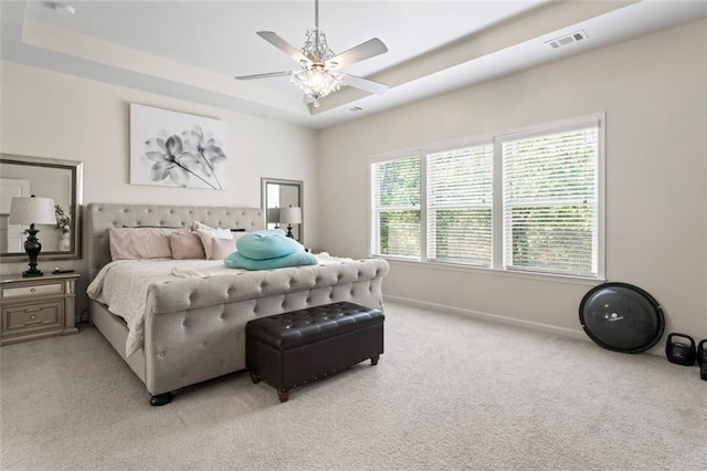 297 Aylesbury Blvd, Mcdonough, GA 30252 - bedroom featuring light colored carpet, a tray ceiling, and ceiling fan