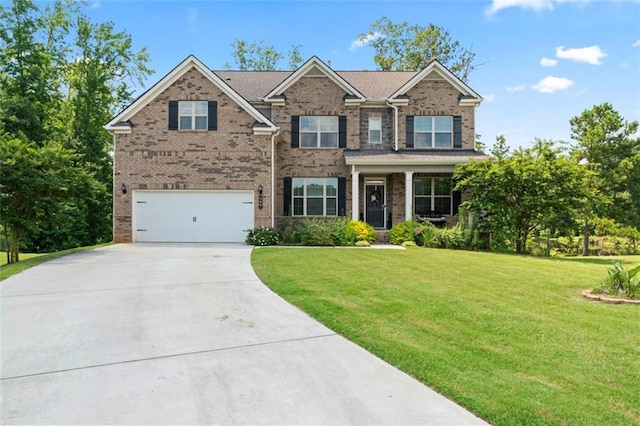 297 Aylesbury Blvd, Mcdonough, GA 30252 - view of front facade with driveway, a front yard, brick siding, and an attached garage