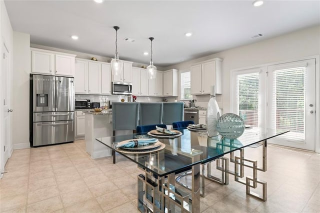 297 Aylesbury Blvd, Mcdonough, GA 30252 - dining space featuring recessed lighting