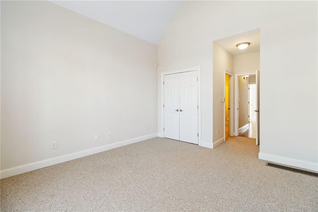 interior space with plenty of natural light, visible vents, baseboards, and wood finished floors