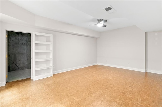 unfurnished bedroom featuring ceiling fan, baseboards, and visible vents