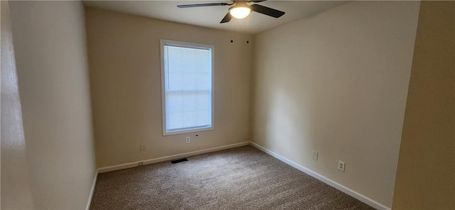 carpeted empty room with ceiling fan