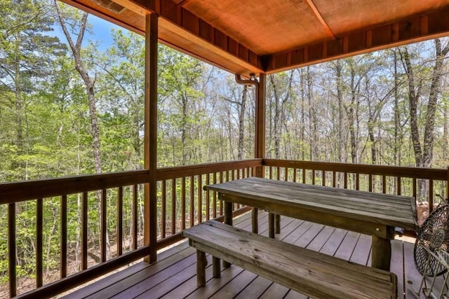 deck with a wooded view