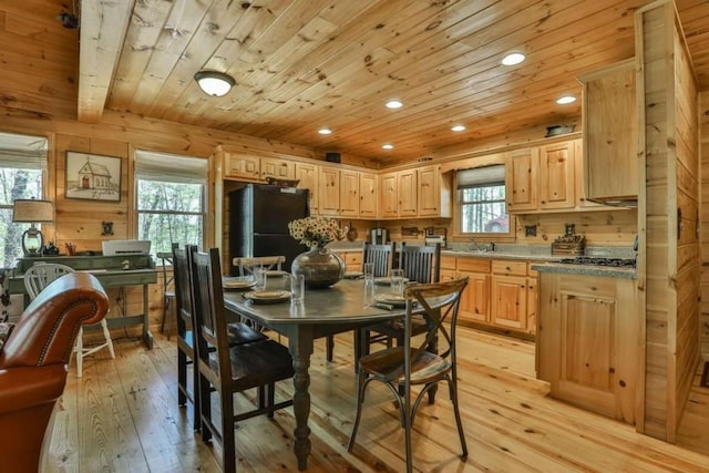 dining room featuring recessed lighting, wood ceiling, and light wood-type flooring