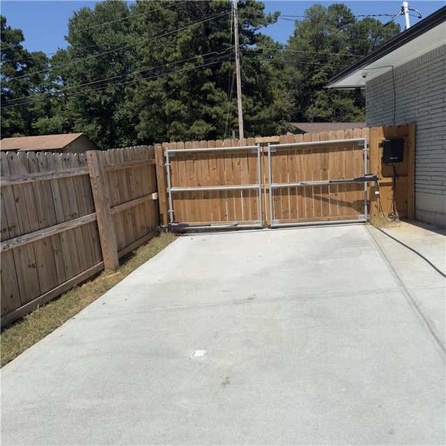 view of patio / terrace featuring a gate and fence